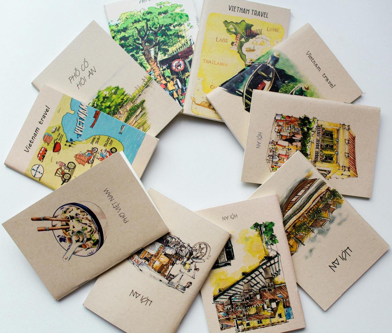 about-us Colorful travel guides and illustrations showcasing Vietnam's attractions.